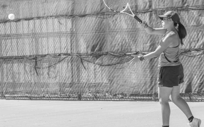 SMOOTH SWING - Levelland Loboette Alexis Sanchez competed in a doubles match at home against the Sweetwater Mustang Tennis Team on Tuesday. The Lobo Pack hit the courts on the road against Liberty High School on Saturday. (Staff photo by Dom Puente)