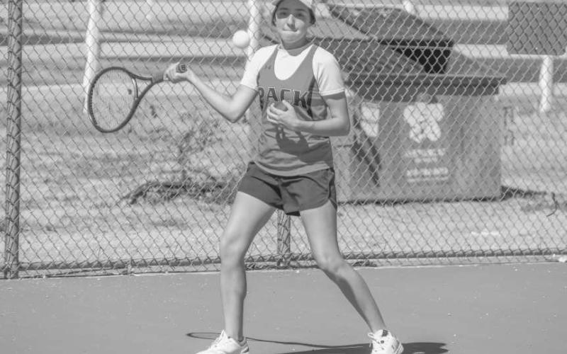 FOCUS ON THE BALL - Levelland Loboette Daniela Perez competed in a doubles match at home against the Sweetwater Mustang Tennis Team on Tuesday. The Lobo Pack hit the courts on the road against Liberty High School on Saturday. (Staff photo by Dom Puente)