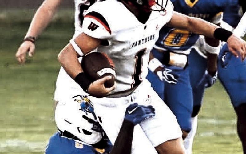 Whitharral Panther Hudson Prowell works to gain ground on a carry against Boys Ranch this past Friday. (Whitharral ISD photo)