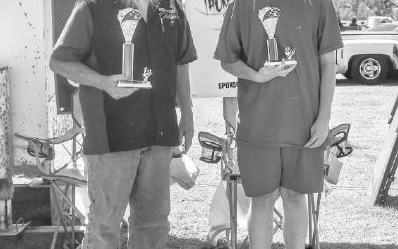 NON FENDER HOT/STREET RODS 49-OLDER- Pictured from left to right are: 1st place Steve Corgill and 2nd place Nolan Wampler for the Non Fender Hot/Street Rods 49-Older Class at the car show on Saturday. ( Photo courtesy of Emily Campos)
