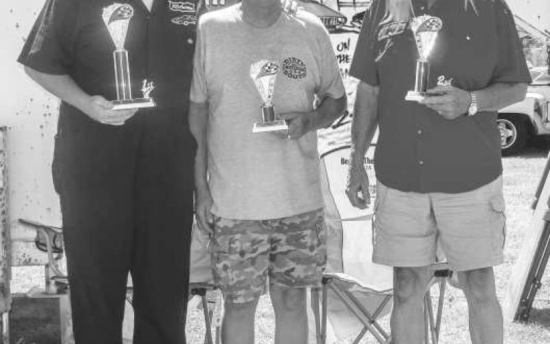 MOPAR MUSCLE CARS 64-81- Pictured from left to right are: 1st place Rich Puryear, 2nd place Rocky Sheppard and 3rd place Danny Fox for the mopar muscle cars class at the car show on Saturday. (Photo courtesy of Emily Campos)
