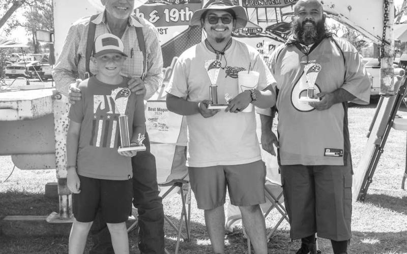 FORD MUSCLE CARS 64-81- Pictured from left to right are: 1st place Dan Patterson, 2nd place Benjamin Flores and 3rd place Kerry Faver for the Ford Muscle Cars 64-81 Class. ( Photo courtesy of Emily Campos)
