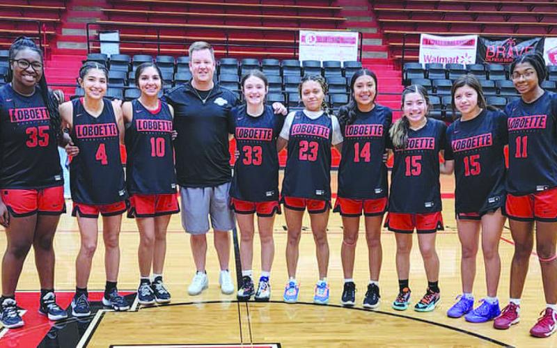 LOBOETTE JV RED- Levelland Head Coach Clay Barnett hosted the Annual Meet the Loboettes last week at Levelland High School. Coach Barnett had the girls display their skills before a friendly competition against parents. Pictured in no particular order are: Emily Perez, Mia Morin, Delaney Delgado, Kaydence Escarcega, Kaylee Penner, Heaven Morin, Tanaesia Brackens, Sydnii Joyce, Presley Smith and coach Nathan Riggan. (Photo Courtesy of Cristal Isaacks)