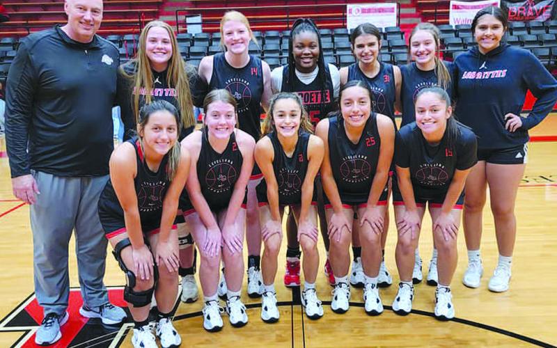 MEET THE LOBOETTES- Levelland Head Coach Clay Barnett hosted the Annual Meet the Loboettes last week at Levelland High School. Coach Barnett had the girls display their skills before a friendly competition against parents. Pictured in no particular order are Adrene Galvan, Laci White, Ellie Philips, Angelica Gonzales, Carly Tienda, Madison Stafford, Olivia Velardez, Leilani Sanchez, Destynii Jones, Emery Smith, Marleah Ruiz and head coach Clay Barnett. (Photo Courtesy of Crystal Isaacks)