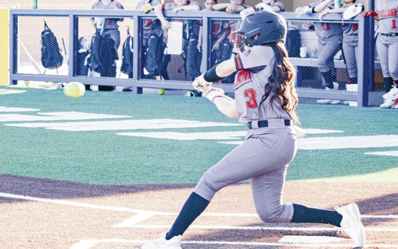 CERTIFIED SLUGGER - Levelland Loboette Jazlyn Diaz gets her hands in on a swing to hit the softball during their game against Frenship Memorial this past Friday at Frenship Memorial High School. (Staff photo by Eric Venkatesan)
