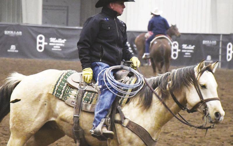 SMOOTH RIDE - Cosigner Lloyd Tschirhart rode Straight Yellow Hair around the arena during an intermission of the CHS Futurity on Friday, November 18. The biography of the horse stated the Mare is 10-years-old and has been used in all aspects of ranching. (Staff Photo by Dom Puente)