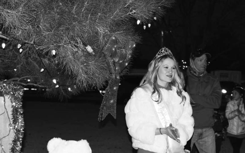 MISS CAPROCK - Turning on the lights at the Levelland SPC campus was this years Miss Caprock Machayla Parkinson. Every year miss caprock screws the last Christmas bulb before the lighting. (Photo Courtesy of Delany Jackson)