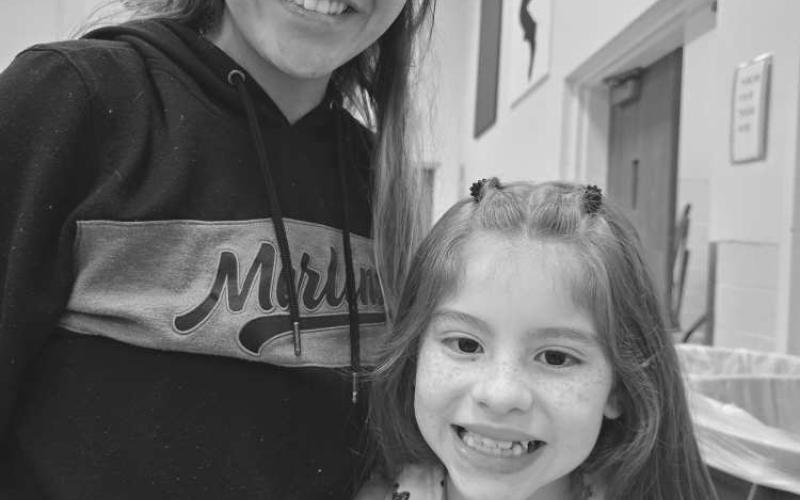 GOODIES WITH GUARDIANS- South Elementary hosted their Goodies with Guardians this Tuesday and had a terrific turnout. Pictured is South Third Grader Majorie Navilee Paiz with her mom who is Levelland Police Officer Ivan Selena Baeza. (Photo submitted by Cristal Isaacks)