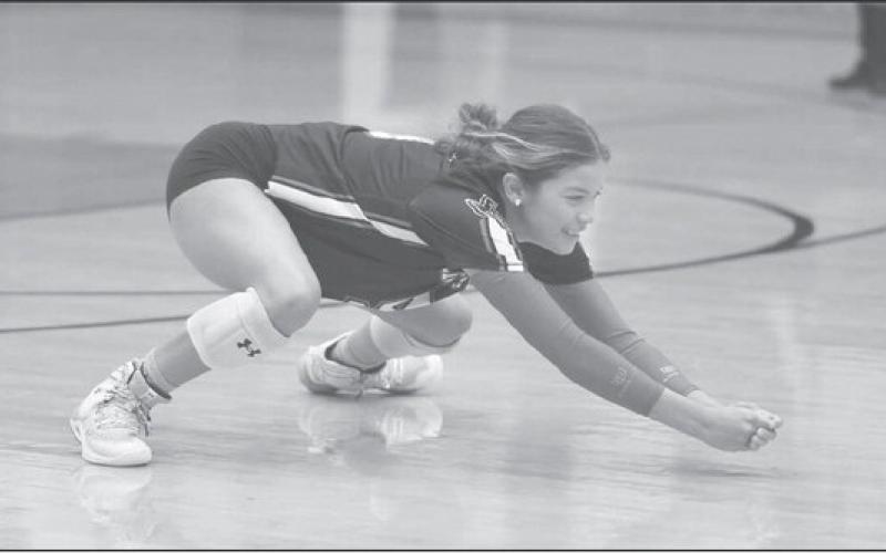 NICE SAVE - Levelland Loboette Aubree Gaona made the athletic play this past Tuesday in their win over Estacado. The Loboettes played their third district game of the season against Lake View this past Saturday as the away team. (Staff photo by Dom Puente)