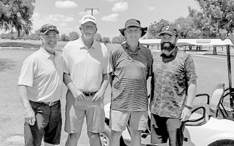 FIRST PLACE SCRAMBLE - The Whiteface Cemetery Association held a golf scramble on August 2. Pictured from left to right are: Joe Don Elam, Jimmy Erickson, Russell Dial, and Jordan Elam who placed first in the event. (Photo courtesy if Traci Baker)