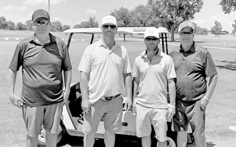 THIRD PLACE SCRAMBLE - The Whiteface Cemetery Association held a golf scramble on August 2. Pictured from left to right are: Clint Pigg, Trent Skinner, Wesley Newland, Corky Kennedy who placed third in the event. Kennedy also made a hole-in-one on the 11th hole. It is the only hole-in-one in tournament play since 2001. (Photo courtesy of Traci Baker)