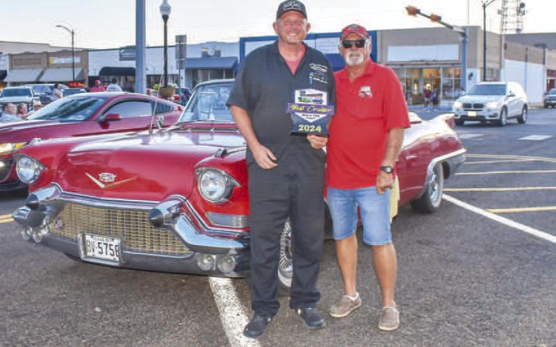 BEST CRUISER - Pictured is Rich Puryear who received one of the Best Cruiser awards from Perry Redden on Friday night during Thunder On The Plains. ( Photo courtesy of Emily Campos)