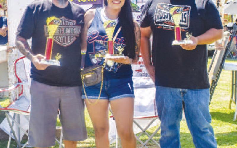 CUSTOM MOTORCYCLE - Pictured from left to right are: 1st place, Ernest Garcia; 2nd place, Vanessa Garcia and 3rd place, Zack Hernandez for the Custom Motorcycle Class at the car show. (Photo Emily Campos)