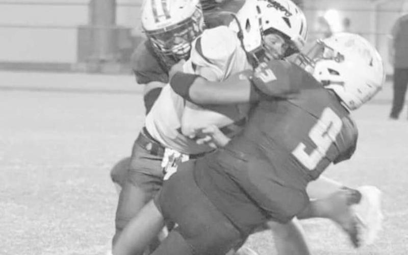 WRAPPED UP - Antelope Axel Rivera had two tackles and an assist in Whiteface’s win over the Cougars, 74-28 last Friday in UIL six-man high school football action. The Antelopes will host Elida, N.M. on Friday for homecoming at 7:30 p.m. (Photo by Holly Crutcher)
