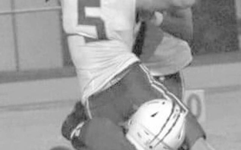 DOWN YOU GO - Luke Gresham got his man for the Whiteface Antelopes in a 74-28 home win over the Klondike Cougars. The Antelopes will host the Elida Tigers from New Mexico for homecoming on Friday at 7:30 p.m.(Photo by Holly Crutcher)
