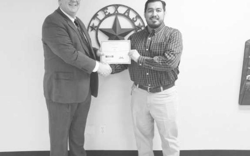ECONOMIC EXELLENCE RECOGNITION - The Levelland Economic Development Corporation (LEDC) was a recipient of the 2024 Economic Excellence Recognition award during the 2025 Texas Economic Development Council (TEDC) Winter Conference, Feb. 28. Pictured is Levelland City Manager James Fisher and LEDC Director Justin Balderas. (Staff photo by Dom Puente)