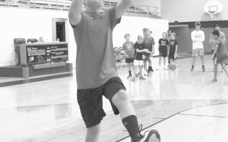 FLOATER - Whitharral student Jackson White did a nice move at the rim for the easy finish. (Staff Photo by Aalijah Soliz)