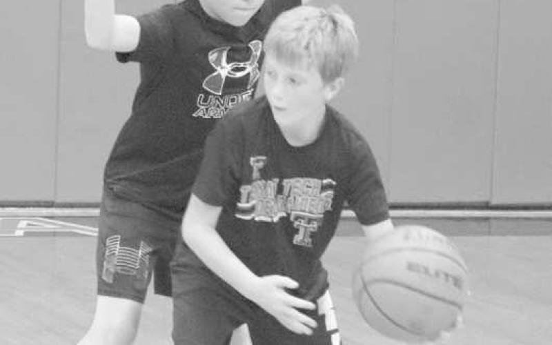 DEFENSE - Whitharral students Caden Bates and Caleb Faver were going at it making each other better.. (Staff Photo by Aalijah Soliz)