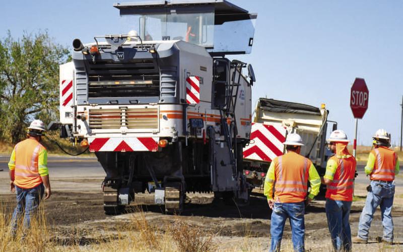 TXDOT ROAD WORK - Road work begin Monday morning for TxDOT at the intersection of U.S. Highway 114 and FM 1490. Conducting road repairs throughout the day, all thru-traffic was diverted down Ellis Street for the remainder of the day. (Staff photo by Victoria Byrnes)