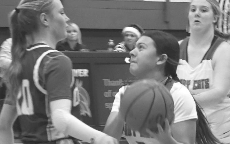 - Dyamon Baker had five points for the Smyer Lady Cats in a 57-43 loss to the visiting Olton Lady Mustangs in UIL high school girls’ basketball action last Friday. The Lady Cats will be in Lubbock at the Caprock Classic Basketball Tournament on December 28-30. (Photo by Jay Kelley)