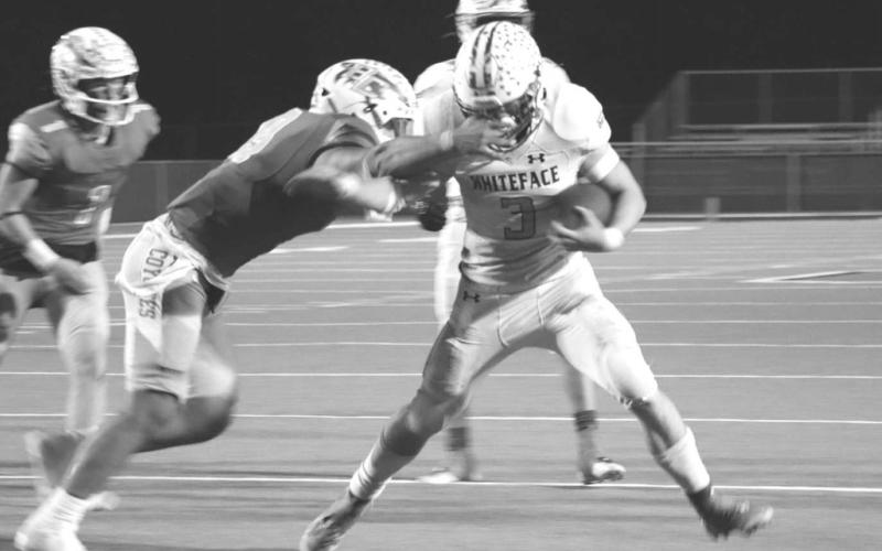 CAN’T BRING ME DOWN - Whiteface athlete Ethan Kauffman ran through the facemask during the teams last playoff game against Borden County in the Area round. Whiteface finished their season with a record of 11-1 with their only loss coming from Borden County. (Staff photo by Aalijah Soliz)
