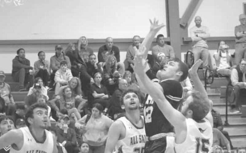 FLOATER - Morton Indian Cade Lyon floated the ball up during the teams contest against the All-Saints Patriots. (Staff photo by Aalijah Soliz)