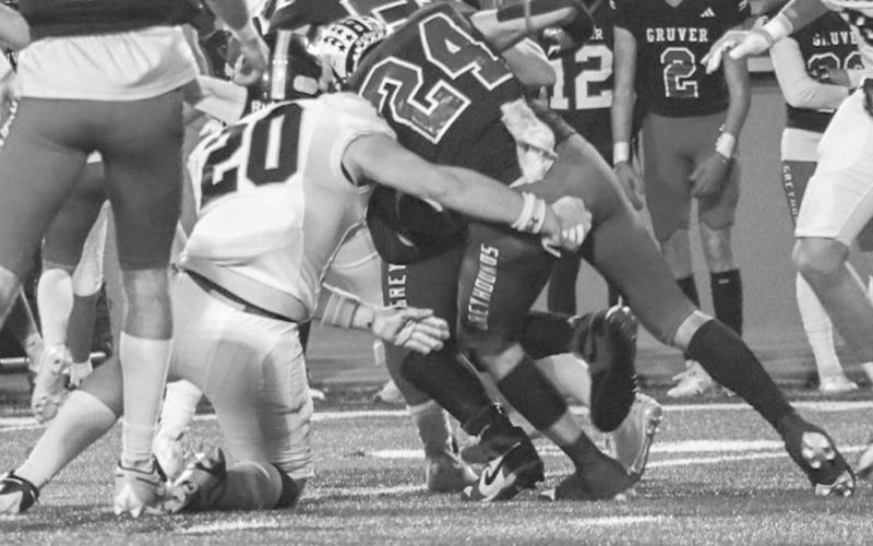 STONEWALLED - Morton Indian Cade Lyon stopped the Gruver ballcarrier in his tracks during the team’s last game of the season in Amarillo. (Staff photo by Aalijah Soliz)