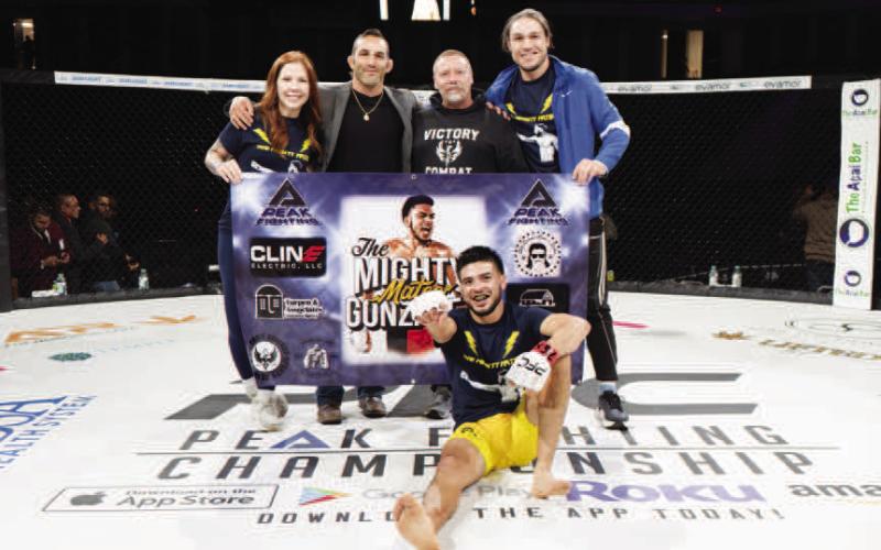 TEAM MIGHTY – Mateo Gonzalez and his team pose for a photo following his 3rd round KO victory against Darrius Jackson at PFC 39 on October 19, 2024. (Photo Courtesy of Mateo Gonzalez)