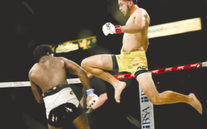 LET IT FLY – Mateo Gonzalez throws a flying knee at his opponent Darrius Jackson in their fight at PFC 39 on October 19, 2024. Gonzalez would later land a devastating knee to secure the knockout victory in the 3rd round. (Photo Courtesy of Mateo Gonzalez)