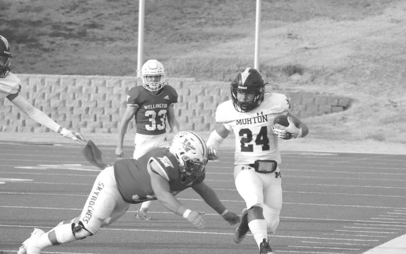 SLIPPERY - Morton running back Christain Enriquez returned the opening kick-off of the area round playoffs and made a man miss last Thursday night. (Staff photo by Aalijah Soliz)