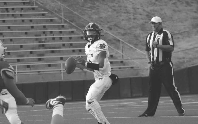 QUICK THINKING - Morton quarterback Dante Chavez went through his progressions during the teams playoff game last Thursday. (Staff photo by Aalijah Soliz)