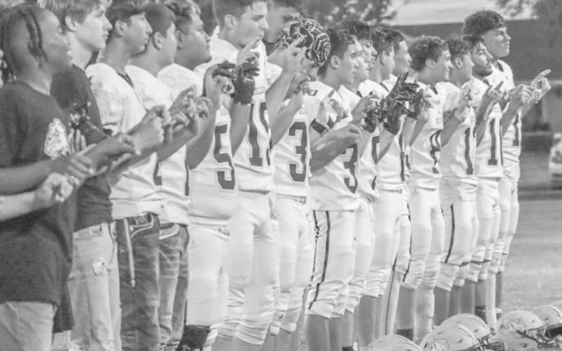 FIGHT SONG - The Anton Bulldogs got in front of their home crowd stands last Friday against Dawson after their dominant win at the half. (Staff photo by Aalijah Soliz)