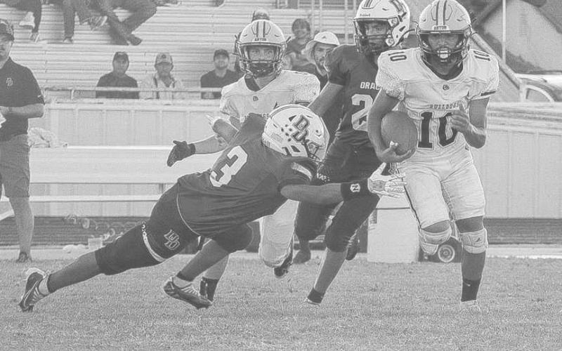 TOO FAST - Anton Bulldog Gavin Martinez outran the tackler on the way to the endzone last Friday during the team’s big win over the Dawson Dragons. (Staff photo by Aalijah Soliz)