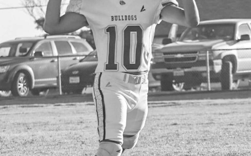 MOBILE - Gavin Martinez rulled out to the right side to make the throw on the run last Friday during the team’s game against the Dawson Dragons on the road. (Staff photo by Aalijah Soliz)