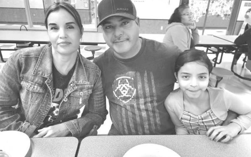GREATMEETING - Levelland ISD hosted a great Bi-Lingual meeting on Tuesday evening. The meetings help teach parents ways to connect school and home activities so that the students have better success. Pictured from left to right are: Flor Maria Rodriguez, Raul Delgado and Emmy Marquez Rodriguez, a 3rd grade student at Capitol Elementary School. (Photo submitted by Crystal Isaacks)