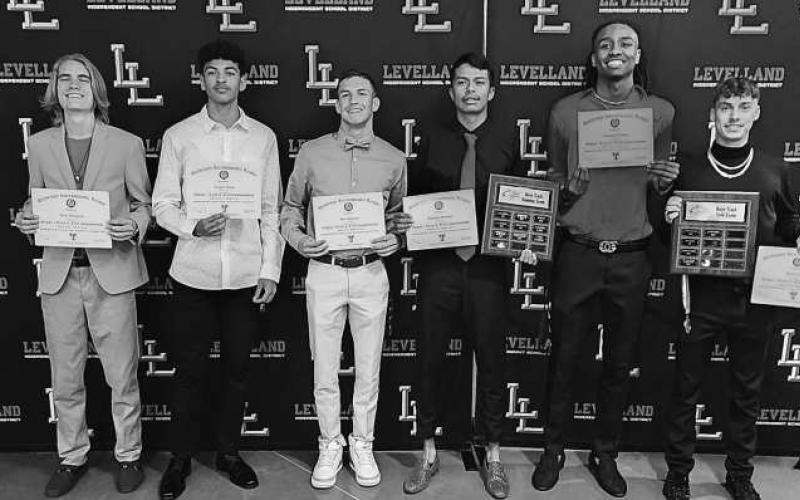 BOYS TRACK AWARDS- The Levelland athletics hosted their annual sports banquet at the Mallet Event Center Monday evening. For track, Ben Alvarado, Matt Bautista, Taeshaun Jones and Ezekiel Arias received the Runner Award. Jacob Garza grabbed the Field Event Award. (Staff Photo Dom Puente)