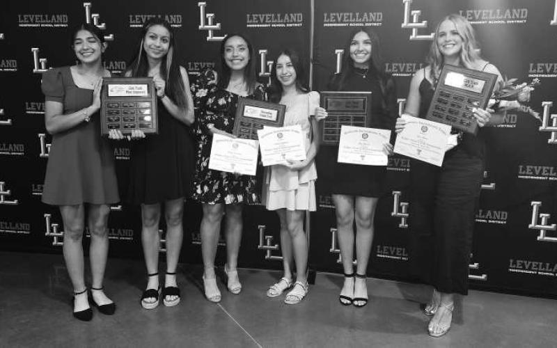 GIRLS TRACK AWARDS- The Levelland athletics hosted their annual sports banquet at the Mallet Event Center Monday evening. For track, Laci White, Olivia Velardez and Evelyn Mendias shared the MVP Award. Mia Morin was named Newcomer of the Year. Ashleigh Barron and Emily Perez shared the Most Improved Award. (Staff Photo Dom Puente)