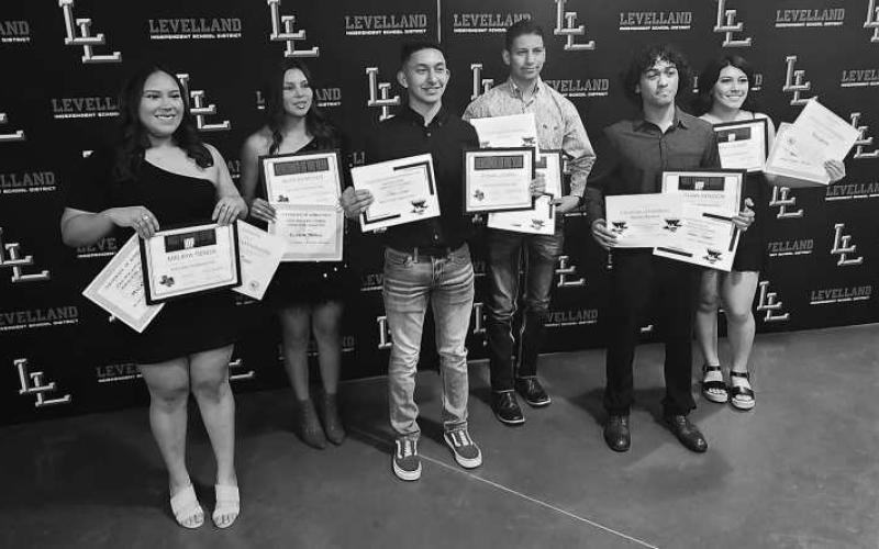 POWERLIFTING AWARDS- The Levelland athletics hosted their annual sports banquet at the Mallet Event Center Monday evening. For powerlifting, Nathan Rendon and RJ Lopez shared the MVP Award. Ethan Lozano was Newcomer of the Year. For the girls, Kadi Salina and Malaya Tienda shared the MVP Award. Allison Monge was named the Newcomer of the Year. (Staff Photo Dom Puente)