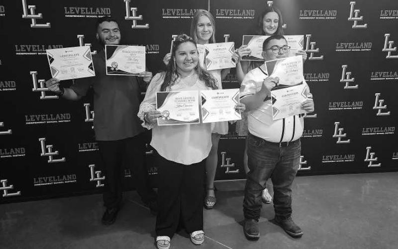 UNIFIED TRACK AWARDS- The Levelland athletics hosted their annual sports banquet at the Mallet Event Center Monday evening. For unified track, Zeth Lopez was named Most Valuable Player, Olivia Schuette-Commitment Award, Khloe Chavarria-Team Role Model, Joe Rodriguez-Junior Coach and Emili Eugenis-Outstanding Manager. (Staff Photo Dom Puente)