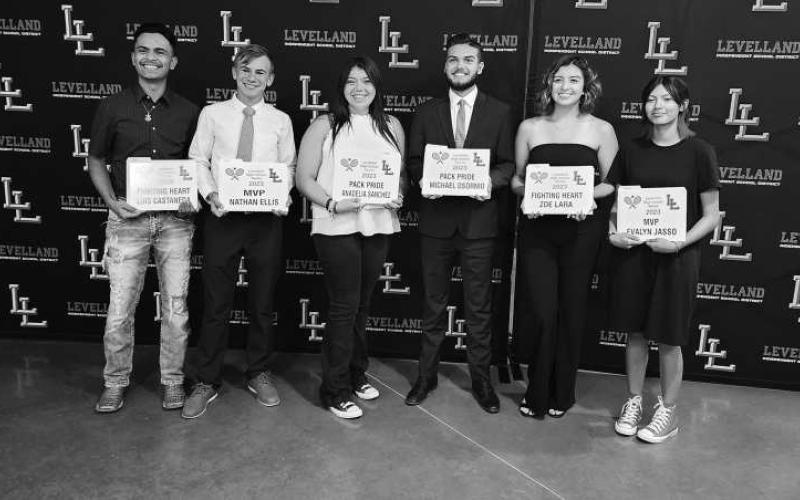 TENNIS AWARDS- The Levelland athletics hosted their annual sports banquet at the Mallet Event Center Monday evening. For tennis, Evalyn Jasso and Nathan Ellis shared the MVP Award. Michael Orsornio and AnaDelia Sanchez shard the Pack Pride Award. Luis Casteneda and Zoe Lara shared the Fighting Heart Award. (Staff Photo Dom Puente)