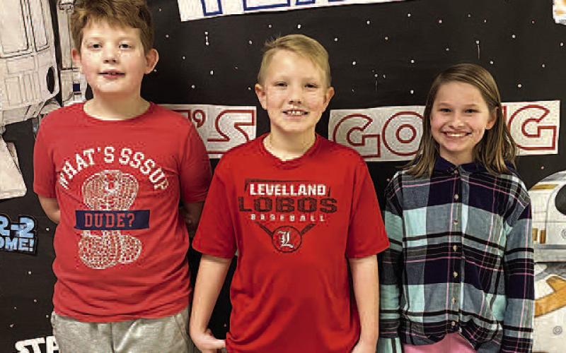 UIL ORAL READING– Levelland Intermediate School fourth grade students earned a Silver Medal after competing in Academic UIL in Big Spring recently. Pictured from the left are LIS fourth grade Oral Reading team members: Kason Birdwell, won first place; Grayson Gibbs placed third; and Hattie Niederhauser took second place. LIS fourth grade UIL teams placed second overall out of nine teams, under the direction of UIL Chair Katie Pena. (Submitted Photo)
