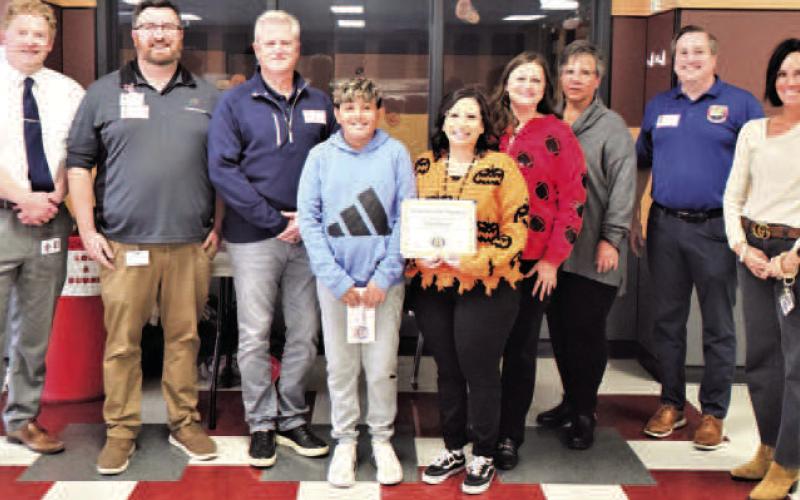 TEACHER ON THE RISE - Levelland ISD Principal Dr. Matthew Birdwell, Ethan Didway from United Supermarkets, Michael Hughes with Teacher on the Rise, LMS student Declan Jaramillo, Kimberly Ibarra, Assistant Principal Amanda Leach, LISD Director of Special Programs Donna Pugh, Shane Sumrow with Teacher on the Rise, and Counselor Sommer Coats. (Levelland ISD photo)