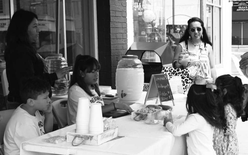 LEMONADE DAY! - CoCo Bee’s lemonade stand at the First Saturday Shop the Square and Lemonade Day on the downtown Levelland square June 3. My Main Squeeze lemonade stand won Best Tasting Lemonade and L&amp;amp;L’s lemonade stand won Best Decorated. (Staff Photo Victoria Byrnes)