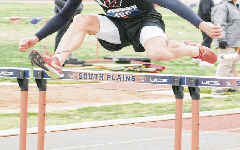 HURDLING MACHINE - Whitharral Panther Damian Rodriguez clears a hurdle during his 110-meter hurdle race this past Friday at the Regional Championships at South Plains College. (Staff photo by Jentezen Smith)