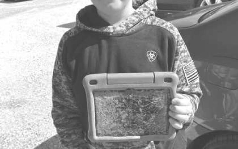 KLBGOLDENPICKERAWARD - Kade Gregory, Hockley County 4H member found the most unusual item at the Community Wide Cleanup on October 7. Gregory found a broken tablet and a hamster wheel. Gregory won the Golden Picker Award, McDonald’s gift card, Keep Levelland Beautiful t-shirt and Don’t Mess with Texas Reusable bag. Josh Meredith Keep Levelland Beautiful Advisory Chair said, “The Most Unusual Item Contest is always a fun part of Community Cleanup event.” (Photo submitted by Chamber of Commerce)