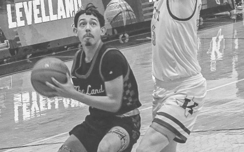 PUMP FAKE - Levelland Lobo Ozzie Solano pump faked the defense during the team’s last game against the Krum Bobcats this past Friday in Abilene. (Staff photo by Aalijah Soliz)