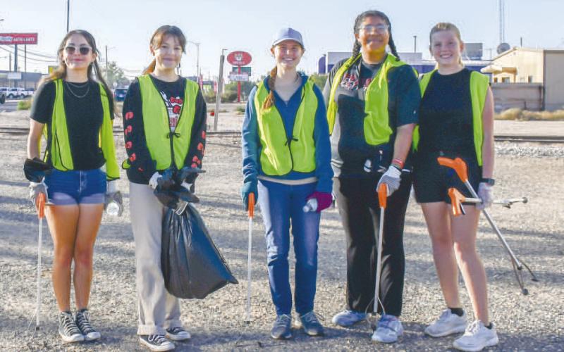 Billie Gonzalez, Gali Hernandez, Ada Niederhauser, Chris Mitchell and Raily Pence spent their Saturday morning volunteering to cleanup up areas along Highway 114 during Keep Levelland Beautiful’s Community Wide Clean-Up Event. (Staff photo by Essence Childres)