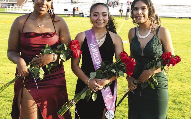 ANTON HOMECOMING QUEEN- Anton High School crowned their homecoming queen last Friday before they hosted Kingdom Prep Academy for the homecoming game. The court is, from left to right; Takyra Goree, Queen Bridget Thomas and Andie Alonzo. Anton loss to the Kingdom Prep Academy Warriors, 48-0 last Friday. The Bulldogs are now 1-2 and look to get back on the winning track in Whiteface next Friday. Game time is 7:30 p.m. (Photo Courtesy of Jay Kelley)