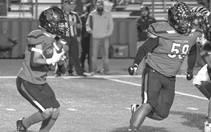 PATIENCE - Levelland running back Ricky Rodriguez waited for the play to develop last Friday. (Staff photo by Dom Puente)