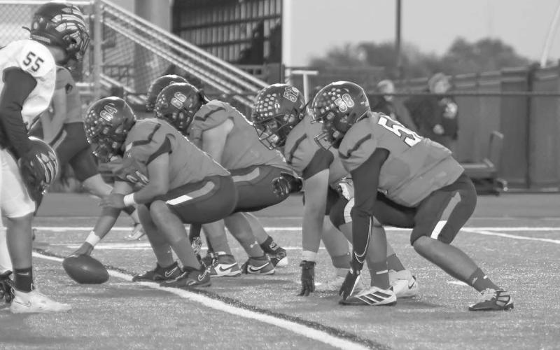 BIG DOGS - The Levelland Lobo offensive line had a great first half against the Seminole Indian defense. The Lobos offensive line battled every game as they were more often than not outsized and had less depth. (Staff photo by Dom Puente)